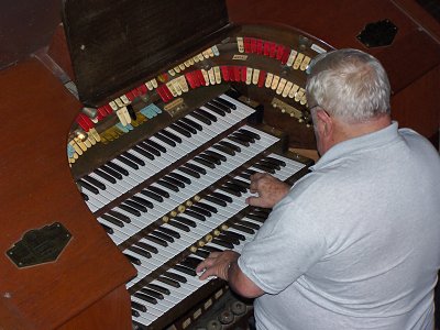 Click here to download a 2592 x 1944 JPG image showing Cyrus Roton at the console.