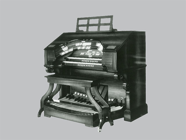 Click here to download a 1600 x 1280 JPG image SHOWING a double bolster scroll-top 2 manual WurliTzer console.