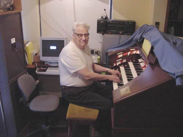 Clint Savage at the console of his Allen GW-319 Digital TPO.