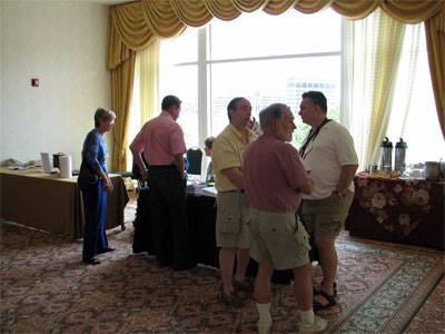 Click here to download a 2592 x 1944 JPG image showing folks registring for the Convention.