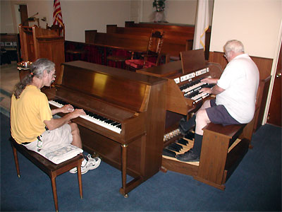 Click here to download a 2592 x 1944 JPG image showing Cyrus Roton and the Bone Doctor jamming at Paul Kealy's church.