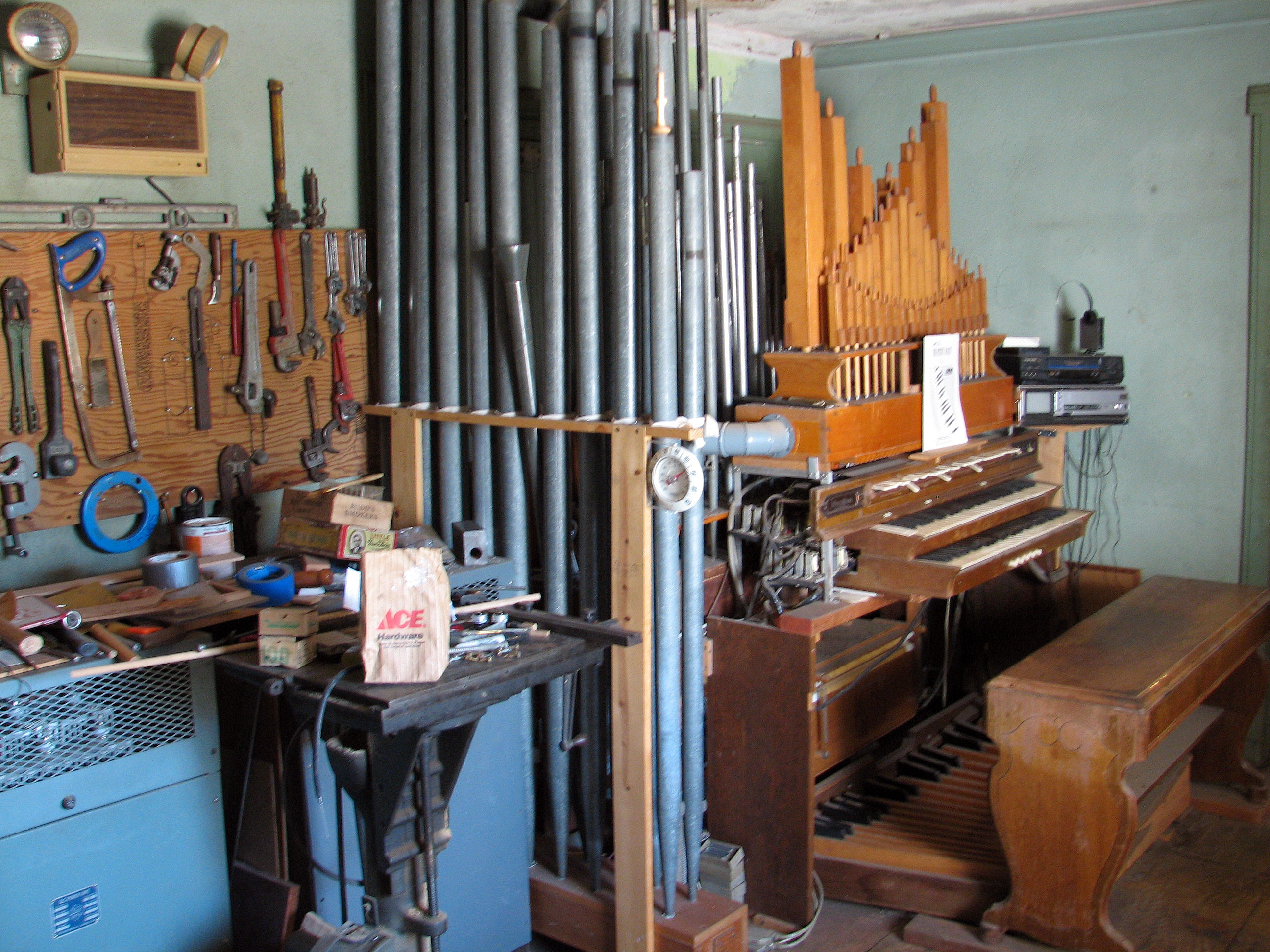 Click here to download a 1944 x 2592 JPG image showing the 2/3 Mighty Spohn Pipe Organ installed in the organ shop upstairs.