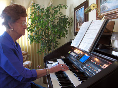 Click here to download a 2592 x 1944 JPG image showing Julia Stortz at the console of her beloved instrument.