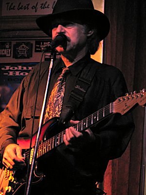 Click here to download a 1536 x 2048 JPG image showing Al Owrutzky on Guitar.