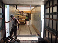 Click here to download a 2592 x 1944 JPG image shoving Tom Hoehn readying the vehicles for undocking.