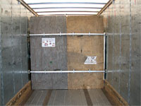 Click here to download a 2592 x 1944 JPG image shoving the cargo bulkhead installed in the 28-foot trailer at ABF in Tampa, ready for shipping to Knoxville, Tennessee.