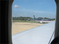 Click here to download a 2592 x 1944 JPG image shoving a view out the window of the aircraft as we roll out of the airport.