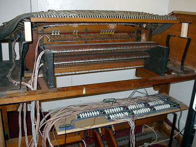 Click here to download a 1600 x 1200 JPG image showing a back view of console showing boards and wiring.