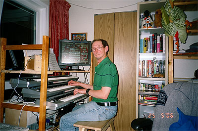 Click here to download a 3088 x 2048 JPG image showing Russ Ashworth at the console of his Mighty MidiTzer.