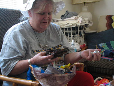 Click here to download a 2592 x 1944 JPG image showing Kimmy's mother, Vicky Wood, opening gifts after arriving at Walnut Hill for her ten day vacation with us.