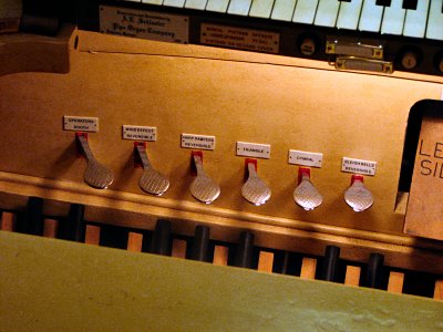 Click here to download a 2816 x 2112 JPG image showing the left side piano pedals.