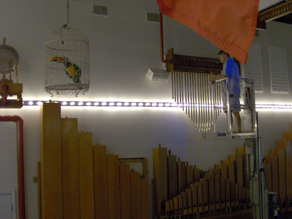 Click here to download a 2048 x 1536 pixel image of Bill Vlasac sevicing the chimes on the Roaring 20's Pizza and Pipes 4/42 Mighty WurliTzer Theatre Pipe Organ.