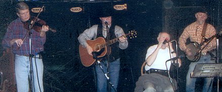 Click here to read the latest news about the Circle of Friends. Ed is on the far right in this picture, playing his banjo.