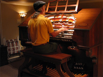 Click here to download a 2592 x 1944 JPG image showing the Bone Doctor at the console of the 3/45 Mighty Walker Digital Theatre Organ at the Doug Powers Residence.