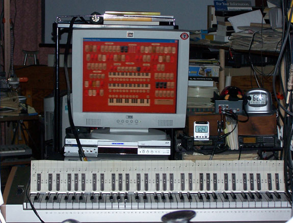 Download a 1917 x 1460 JPG image of Fred's MidiTzer, looking at the center flat panel LCD monitor.