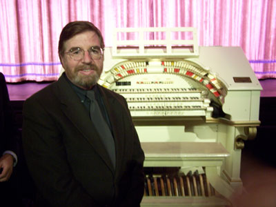Click here to download a 2048 x 1536 JPG image of Jim Henry standing in front of the 3/10 Mighty WurliTzer Theatre Pipe Organ installed at the Orpheum Theatre in Los Angeles, California.