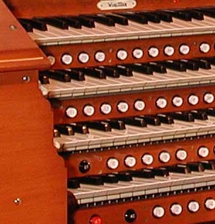 The Thumb Pistons, under the keys of a large Theatre Pipe Organ console. Click here to see the entire console.