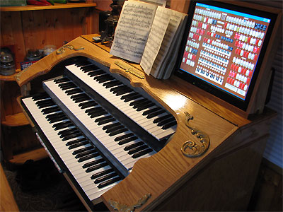 Click here to see the Mighty MidiTzer Style 260 Special Virtual Theatre Pipe Organ installed at Dan Rowland's residence in Akron, Ohio.