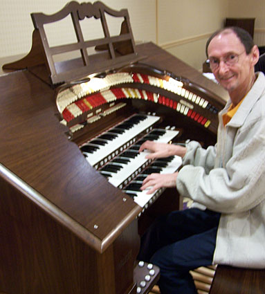 Click here to download a 1932 x 2576 JPG image of Russ Ashworth enjoying the Mighty Walker RTO 3/35 Digital Theatre Organ that Bob built.