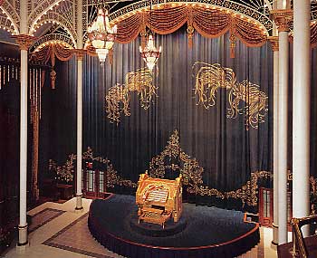 Here, you can see the organ console on the lift in the stage of the huge Salon.