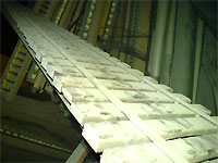 Click here to download a 640 x 480 JPG image showing a rack of metal harp bars.