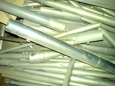 Click here to download a 640 x 480 JPG image showing a jumbled array of metal Reed pipes.