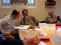 Click here to download a 640 x 480 JPG image showing the planning papers being brought out on the table.