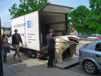 Click here to download a 1024 x 683 JPG image showing the console being loaded for delivery to the restoration facility.