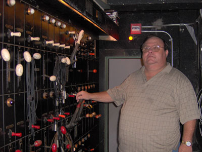 Click here to download a 2048 x 1536 JPG image of Bill Shrive standing next to the Tampa Theatre Lighting Control System.