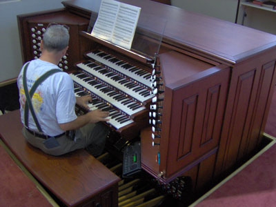 Click here to download a 2048 x 1536 JPG image showing Tom Hoehn at the console of the majestic 4/93 Rodgers/Rufatti/Wicks Church Pipe Organ installed at the First United Methodist Church of Clearwater, Florida.