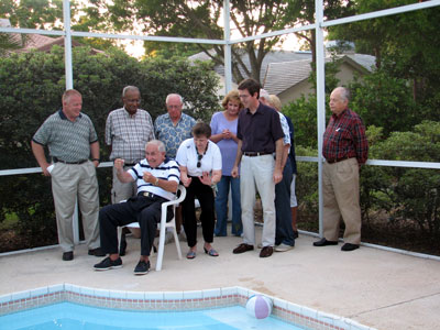 Click here to download a 2592 x 1944 JPG image showing members of the Choir playing Charades by the poolside at Ebbie's home.