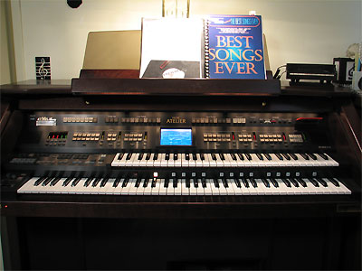 Click here to download a 2576 x 1932 JPG image showing the keydesk of Eleanor Winnemore's Roland Atelier Digital Residence Organ.